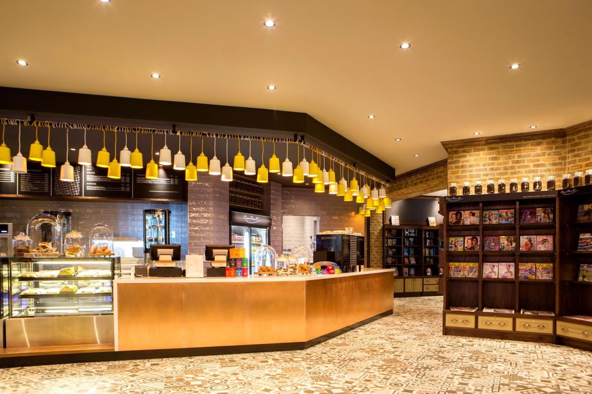 The Palace Of The Lost City At Sun City Resort Экстерьер фото The Coffee Bean & Tea Leaf in the lobby of the Ritz-Carlton, Singapore